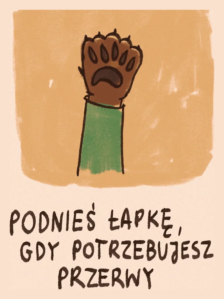 Rysunek: uniesiona łapka misia w zielonym rękawku